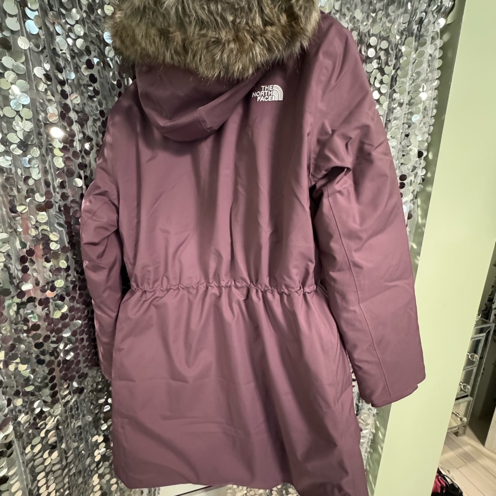 The North Face Midnight Mauve Parka with Faux Fur and matching pair of gloves.